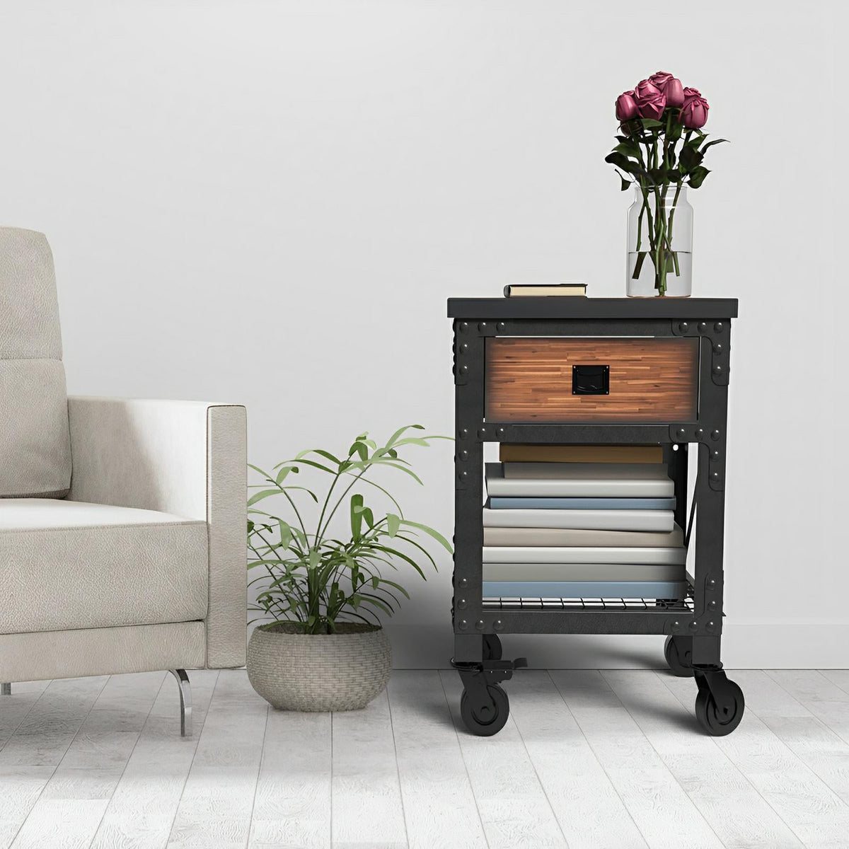 Duramax 1-drawer rolling industrial workbench with books and plant next to a sofa in a modern living space.