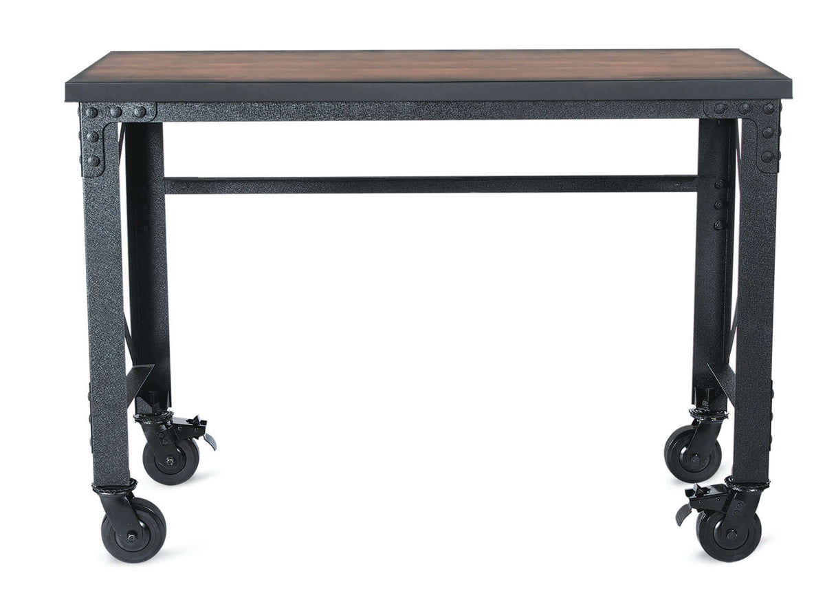 Duramax 52x24 inch industrial worktable with caster wheels, dark wood top, and metal frame for versatile workspace use.