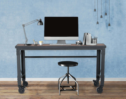 Duramax 62x24 industrial worktable with wooden top and wheels, set in modern workspace featuring a computer and stool, model 68021.